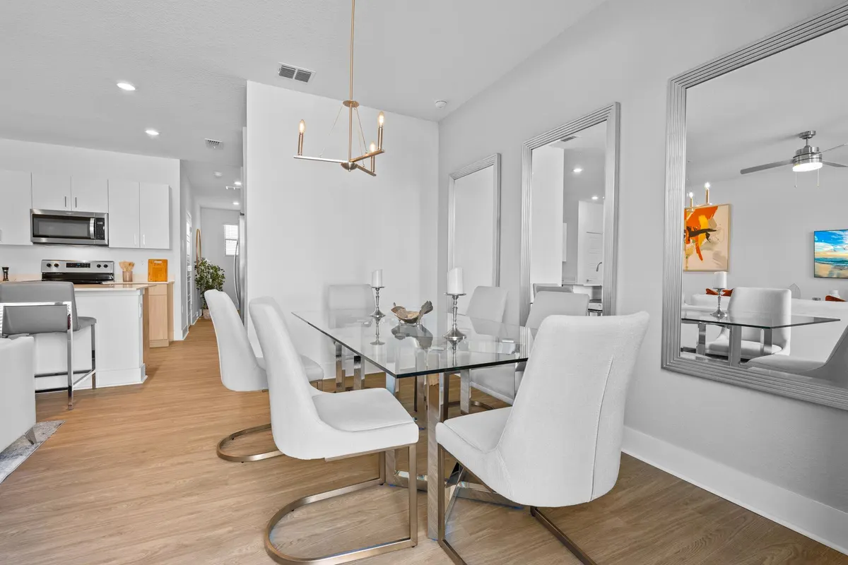 Dining table for six under a pendant fixture